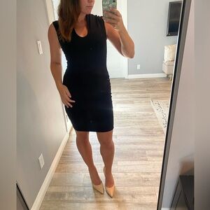 Glare black dress with zip back and plunge v neck.  Size small.